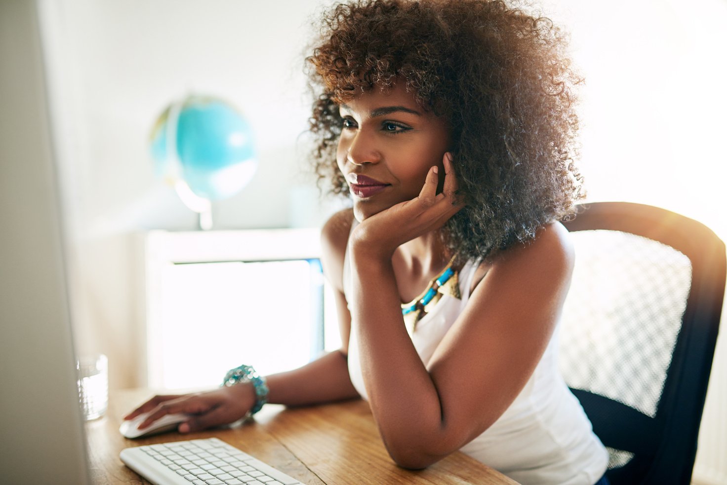 Young Black Girl Working 